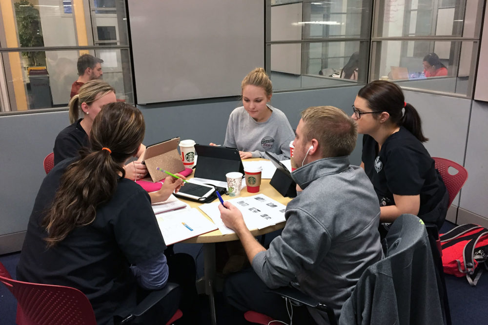 People using group study rooms