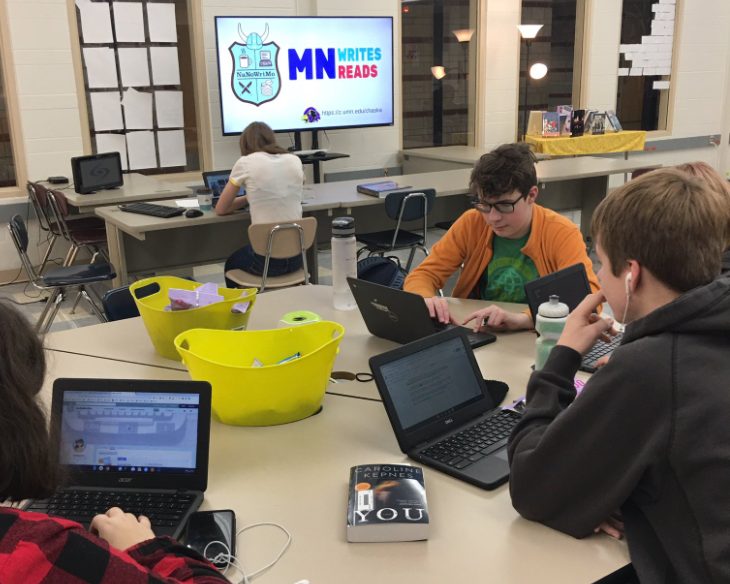 Students writing during a MN Writes MN Reads events