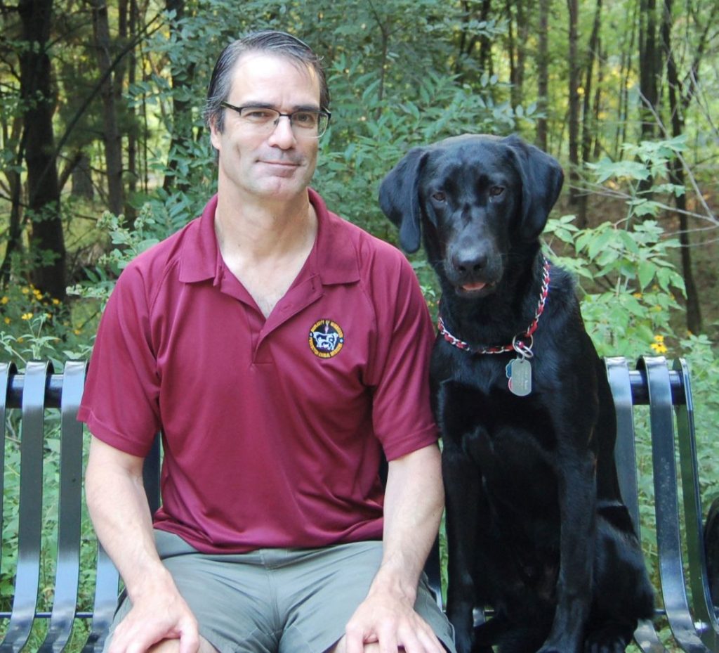 André Nault with Pogo the dog