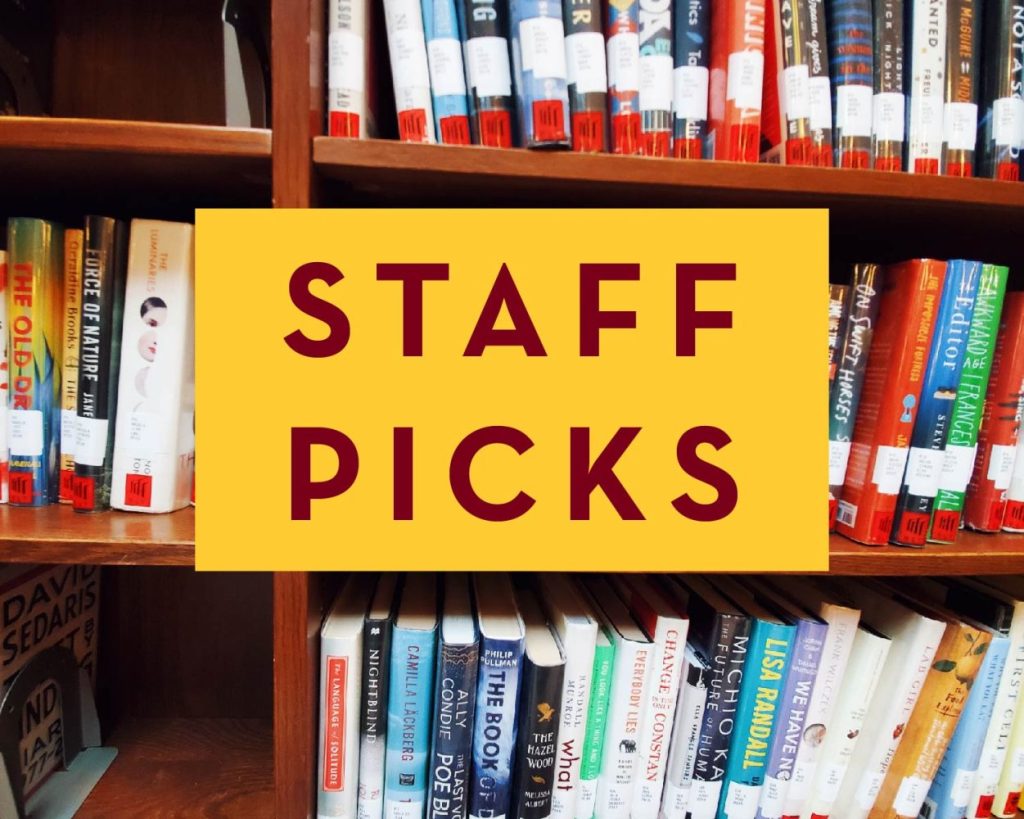 A bookshelf at Walter Library with overlaid text that reads "Staff Picks"