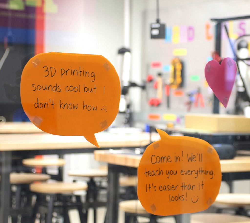 Sticky notes on the HSL Makerspace window inviting users to 'Come in! We'll teach you everything. It's easier than it looks!'