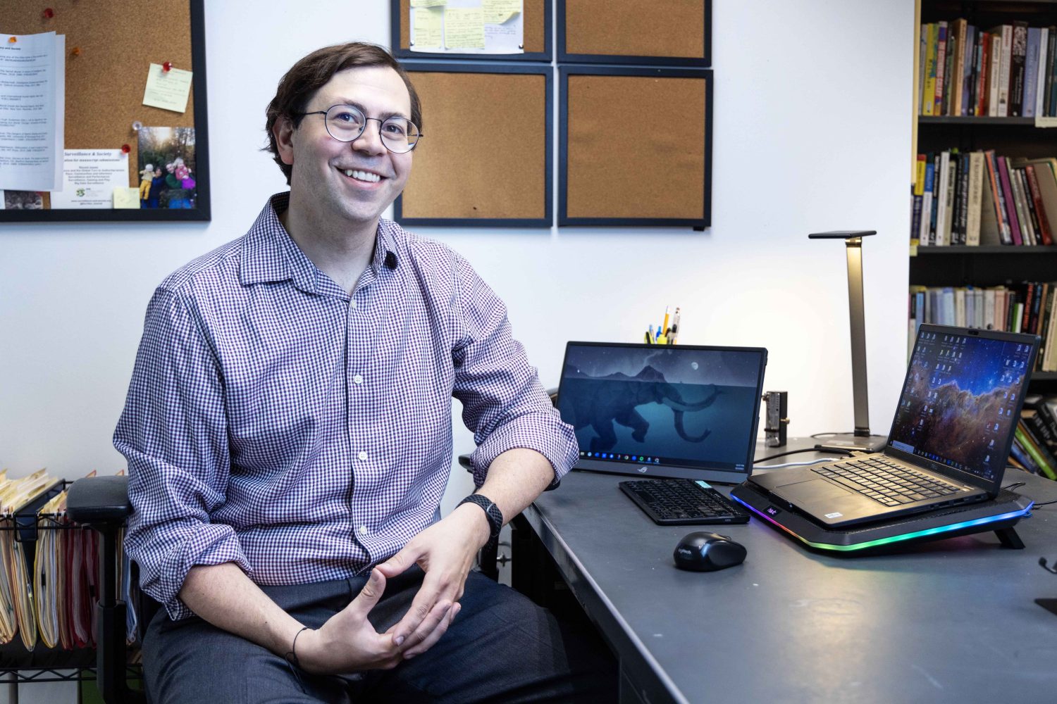 Atilla Hallsby, associate professor in the communication studies department at the University of Minnesota, poses for a portrait on Thursday, Aug. 3, 2023. Hallsby is author of the open-access textbook, "Reading Rhetorical Theory," published with the help of the UMN LIbraires' Partnership for Affordable Learning Materials. (Photo/Adria Carpenter)