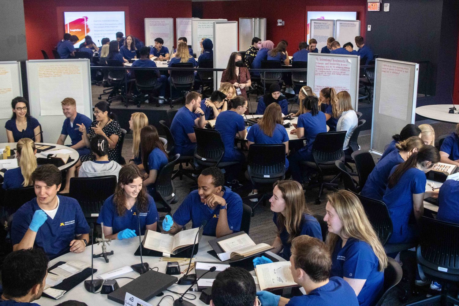 First year dental students examine different materials in a World Cafe classroom structure. (Photo/Adria Carpenter)