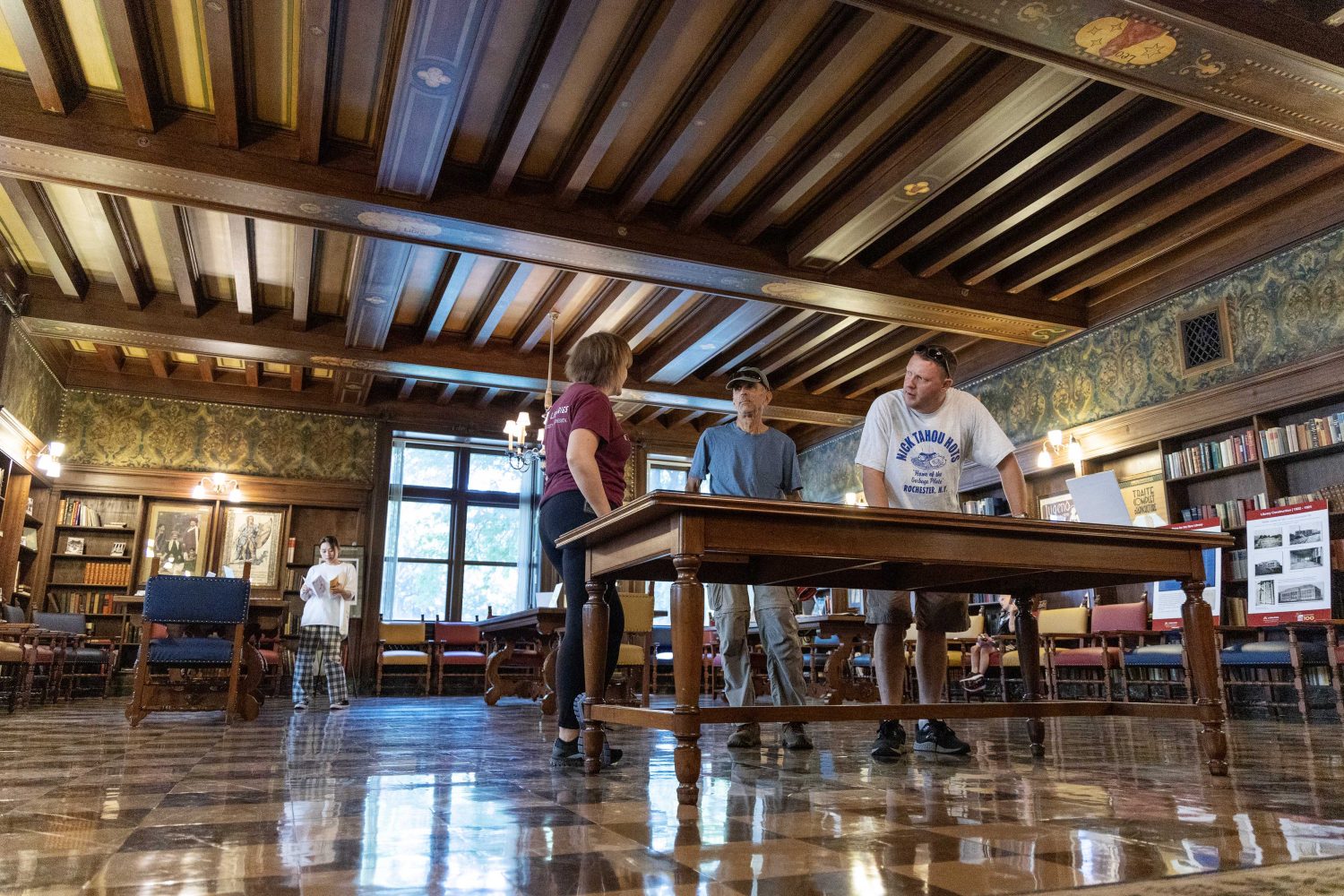 Community members learn about the Arthur Upson Room in the Walter Library. (Photo/Adria Carpenter)