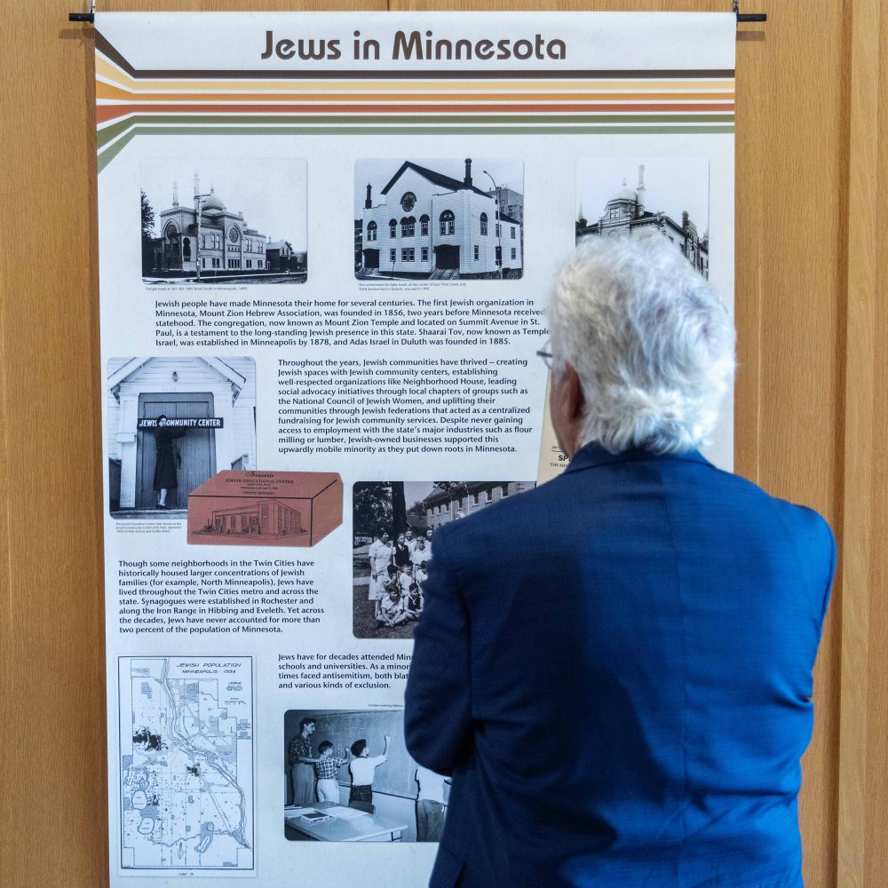 Attendees browse the Symbolic Significance exhibit opening event on Monday, Sept. 11, 2023. (Photo/Adria Carpenter)
