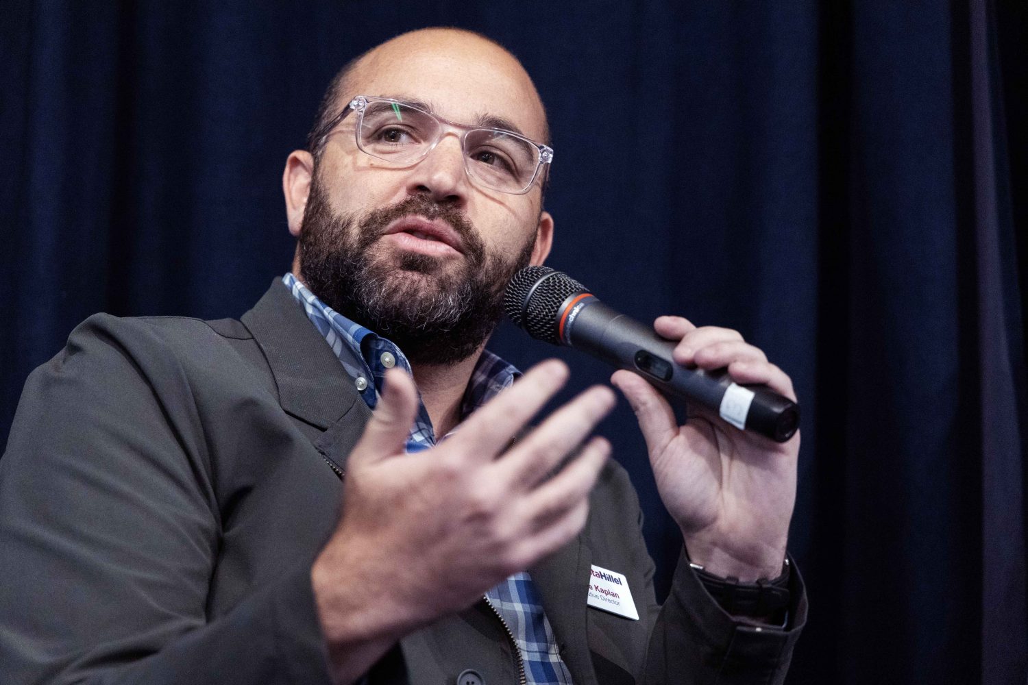 Benjie Kaplan, executive director of Minnesota Hillel, speaks at the Symbolic Significance exhibit opening event on Monday, Sept. 11, 2023. (Photo/Adria Carpenter)