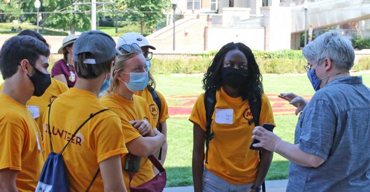 Ana Grogan, third from left, hears from a Library staffer