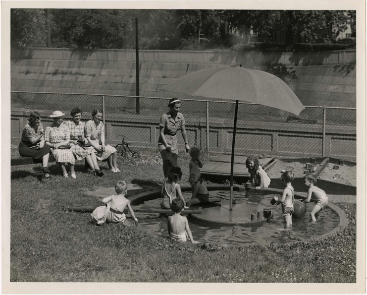 Children attending the University Nursery School play in a wading pool while being observed, 1939. http://purl.umn.edu/81076.