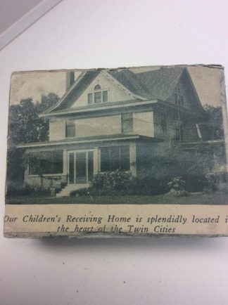 The Lutheran Social Service of Minnesota records include etched stamps used for producing publications. This photo shows a stamp with the image of the Children's Receiving Home ca. 1925-1940.