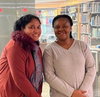 Deb and Sandra, two Grants in Aid awardees, in a Libraries setting.