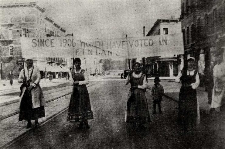 "Standard-Bearers" in Finnish folk costumes marching in the women's suffrage parade, New York City, 1917. Immigration History Research Center Archives