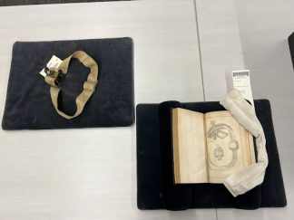 A tourniquet artifact alongside an illustration of a tourniquet