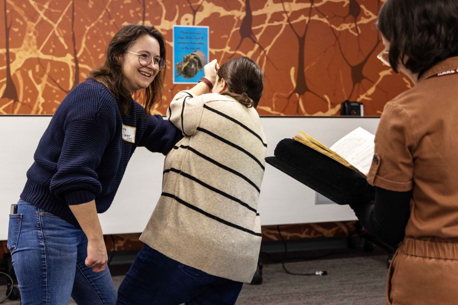 WHL staff demonstrate battle techniques during the Wangensteen pop-up exhibit.