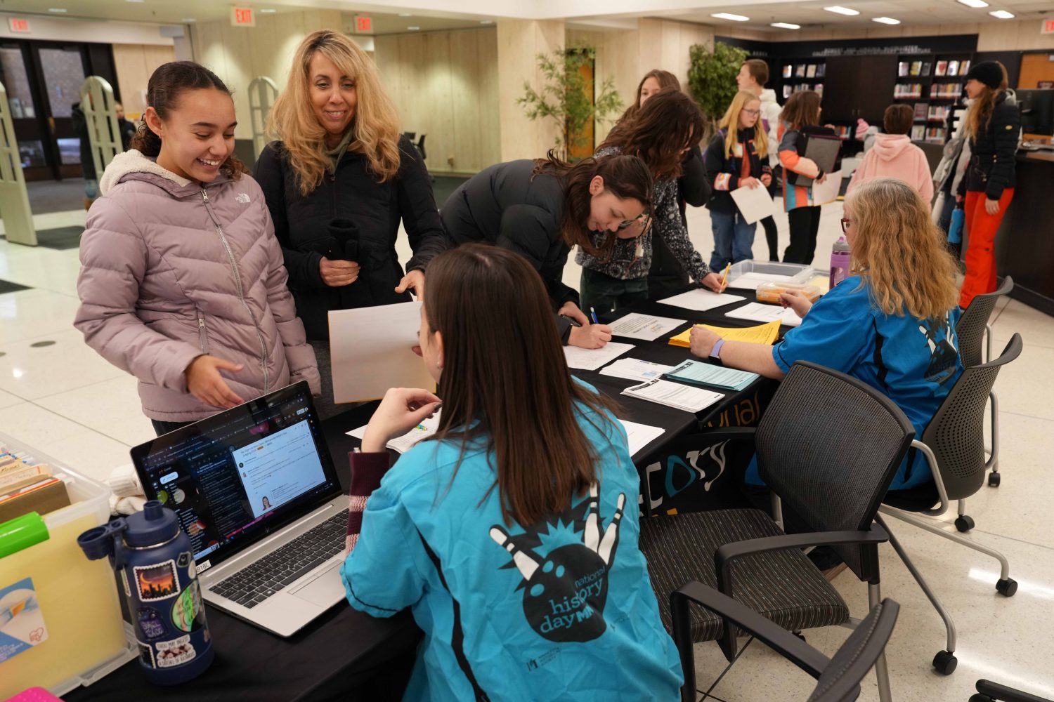 Twin City students work on their National History Day projects at Wilson Library during the annual Gopherbaloo on Saturday, Jan. 13, 2024. (Photo/Luke Logan)