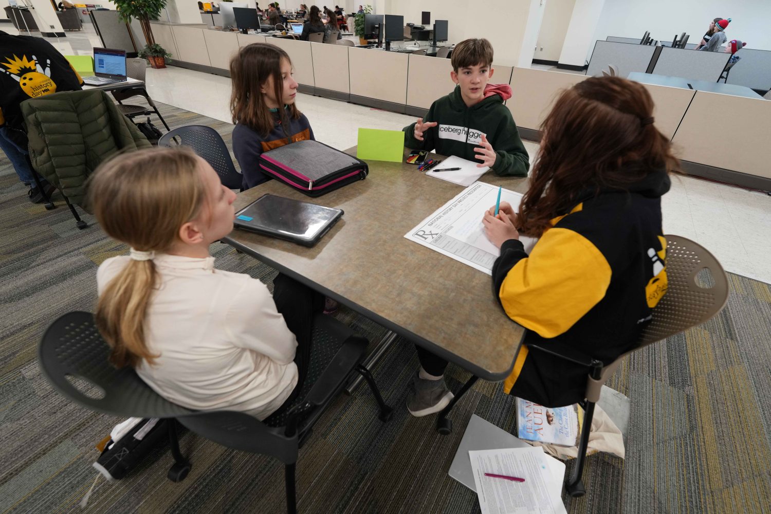 Twin City students work on their National History Day projects at Wilson Library during the annual Gopherbaloo on Saturday, Jan. 13, 2024. (Photo/Luke Logan)
