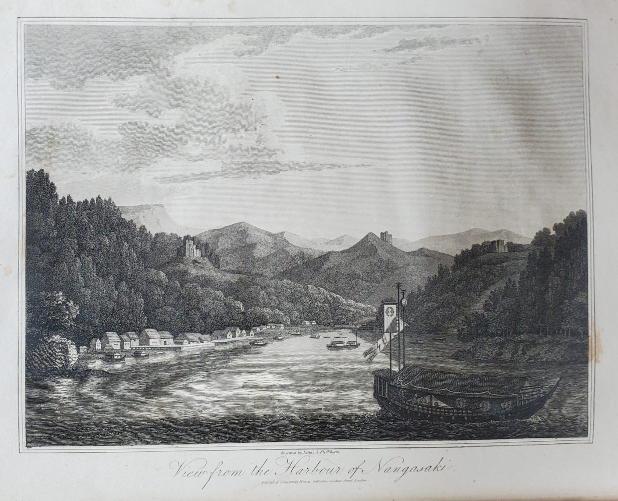 Harbor with mountains in the background and houses along the shore in the foreground to the left. A boat dominates the foreground to the right.