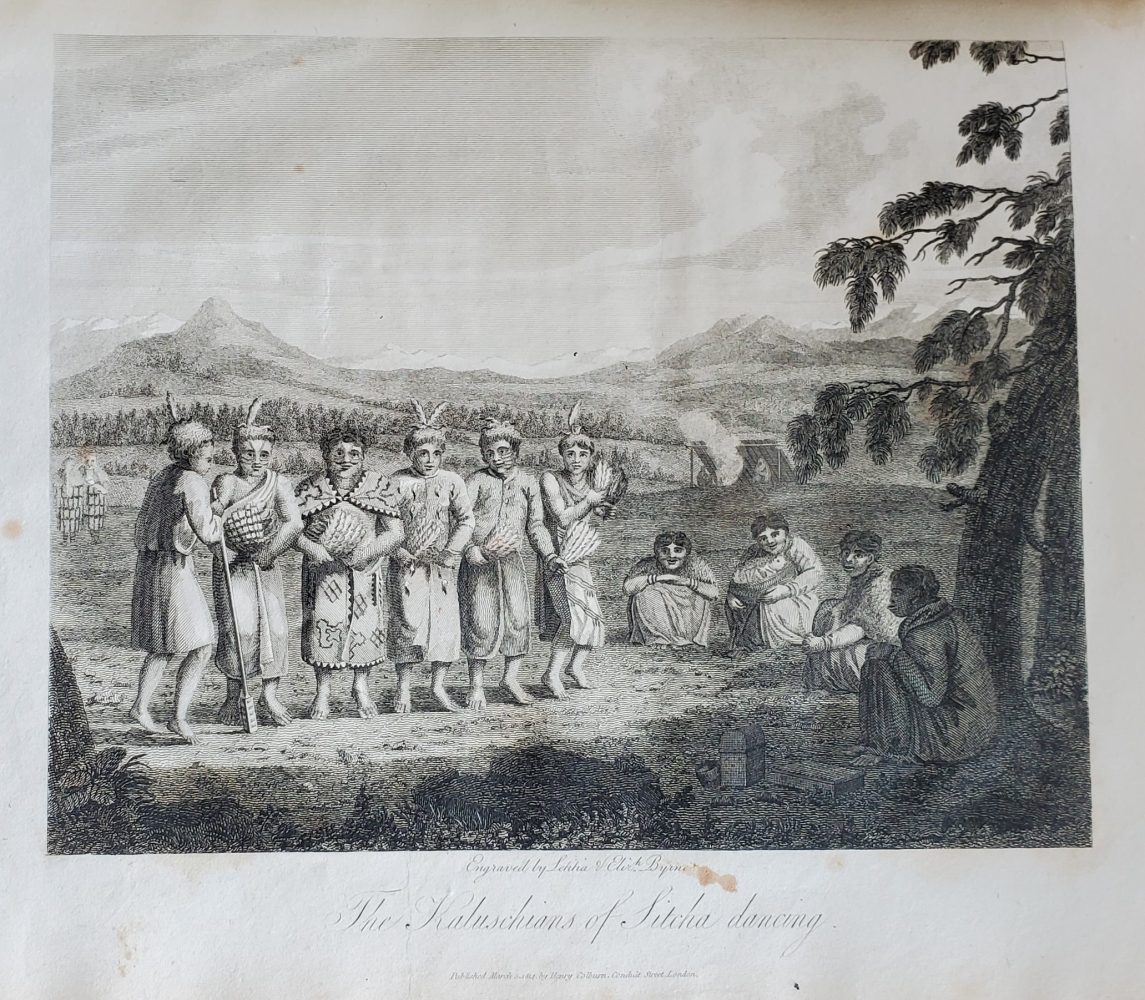 Six people in a row, dancing; four others sitting on the ground and watching.