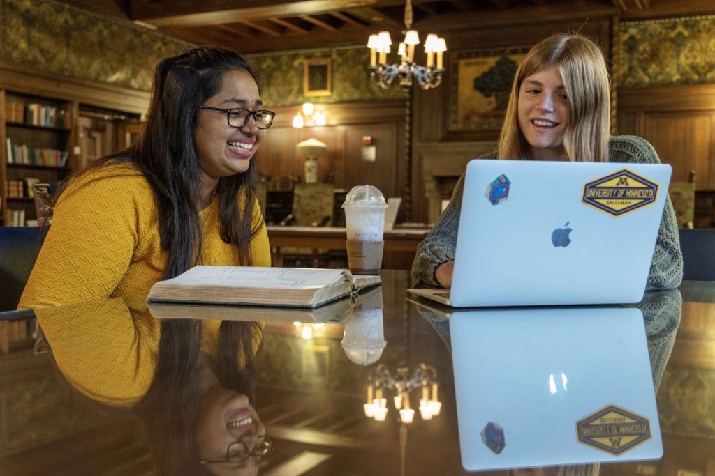 Abby Zumbrunnen and Anupama Rao, two peer research consultants, pose for a candid portrait at Walter Library on Friday, Sept. 22, 2023. (Photo/Adria Carpenter)