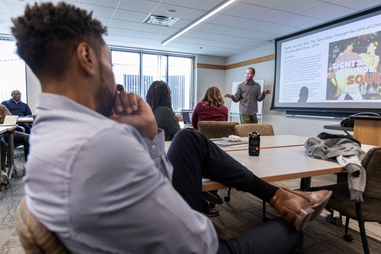 Davu Seru, curator of the Givens Collection of African American Literature, speaks with the YMCA fellows on Wednesday, April 17, 2024. (Photo/Adria Carpenter)