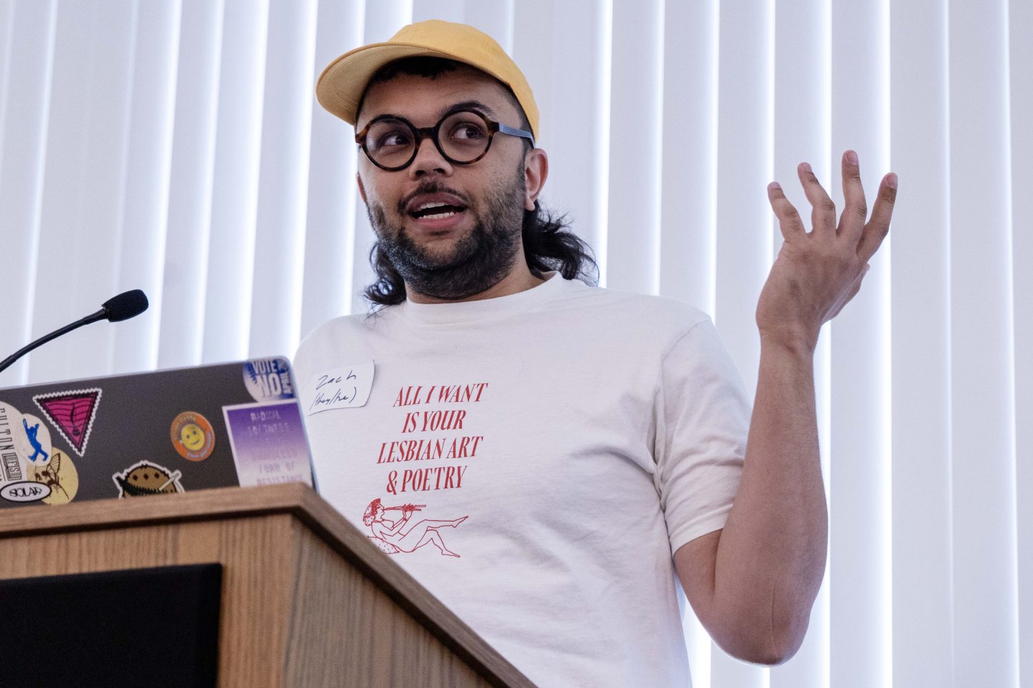 Zach Frazier, founder of Astringent Press and the Midwest Zine Archive, speaks at the Midwest Queer and Trans Zine Fest conference at Andersen Library in Minneapolis on Friday, October 18, 2024. (Photo/Adria Carpenter)