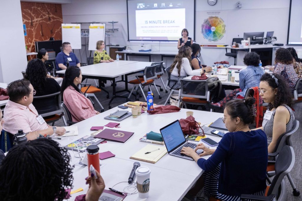 The Minnesota Institute cohort gathers at the Health Sciences Library, on Monday, July 22, 2024. (Photo/Adria Carpenter)