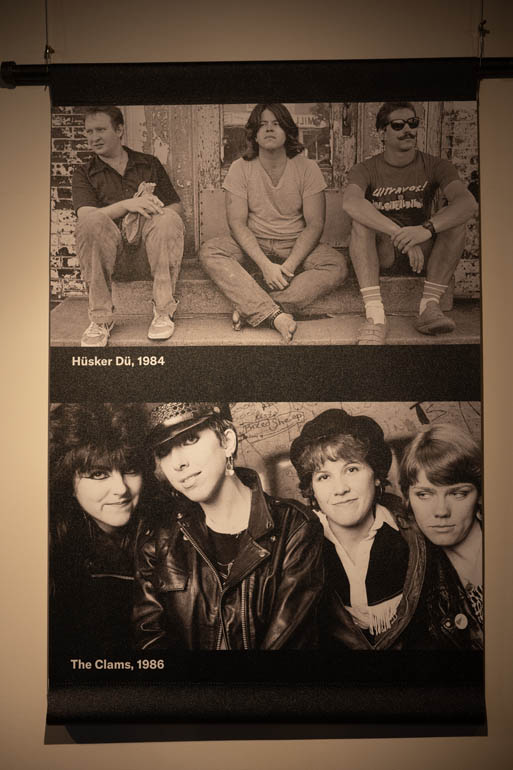 Photographs from Daniel Corrigan's book "Heyday: 35 Years of Music in Minneapolis," on display in the "Music on Hennepin" exhibit, on Monday, December 9, 2024. (Photo/Adria Carpenter)