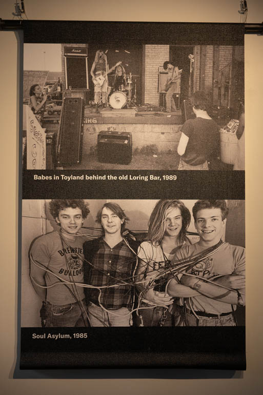 Photographs from Daniel Corrigan's book "Heyday: 35 Years of Music in Minneapolis," on display in the "Music on Hennepin" exhibit, on Monday, December 9, 2024. (Photo/Adria Carpenter)