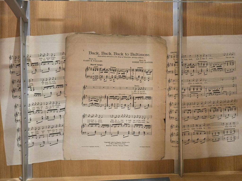Sheet music, held at the Givens Collection, is on display for the exhibit “Listening for Blackness” by Addison Cox
