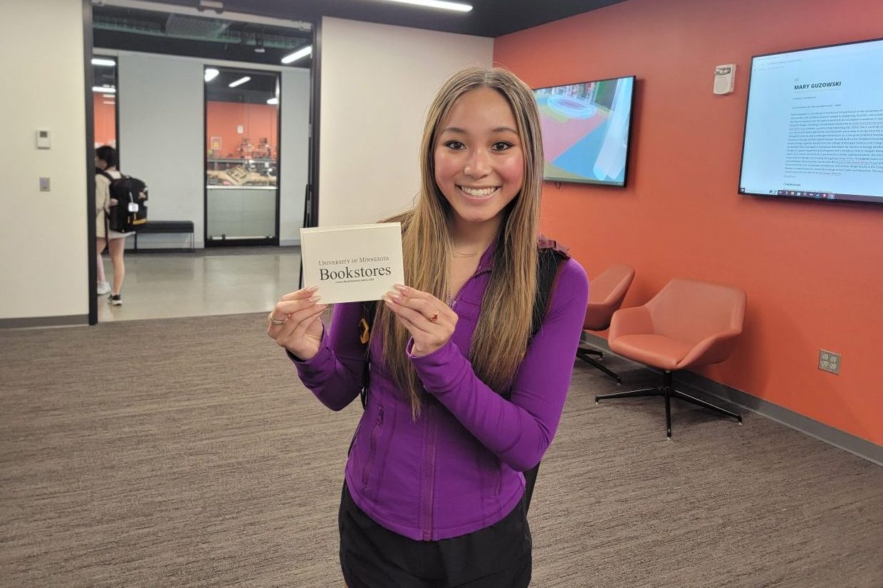 Courtney Phillippi poses for a picture after winning second place for her podcast, "Navigating Body Image in the Digital Era."