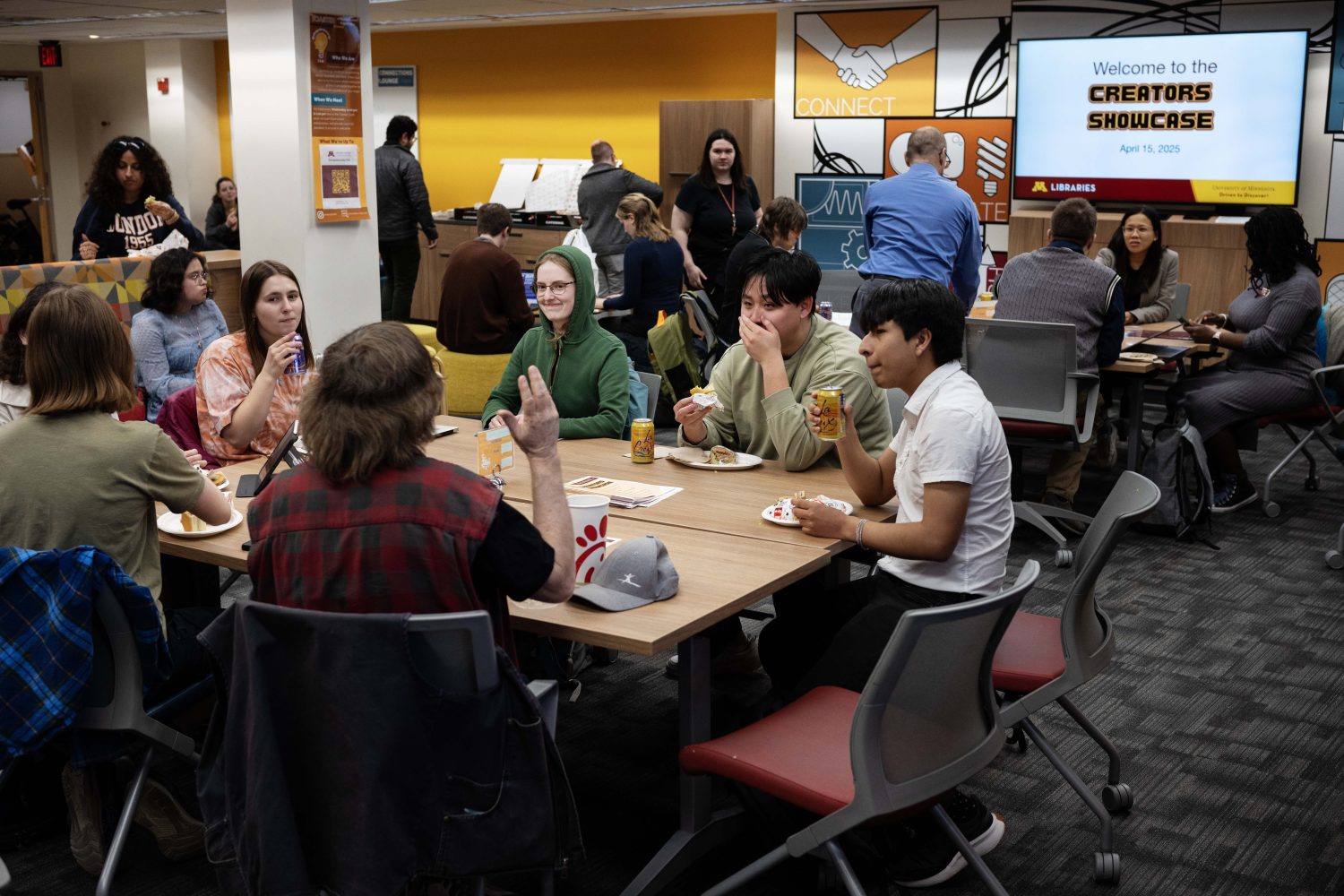 Students watch presentations at the Creators Showcase on April 14, 2025. (Photo/Adria Carpenter)