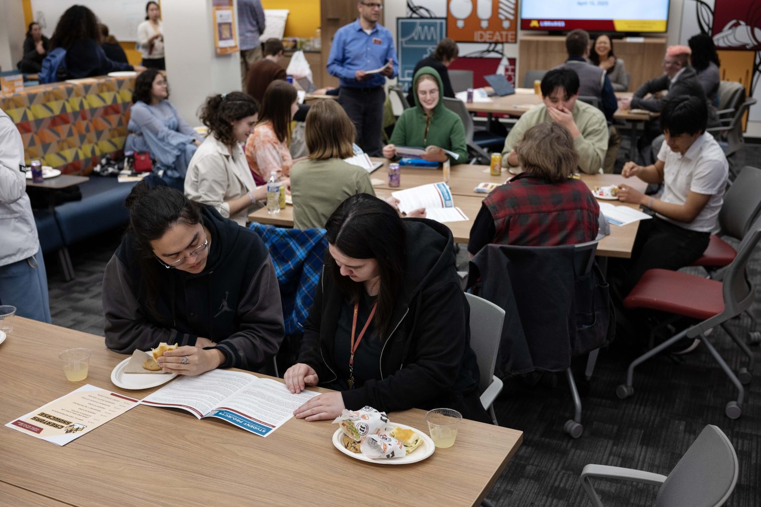 Students watch presentations at the Creators Showcase on April 14, 2025. (Photo/Adria Carpenter)
