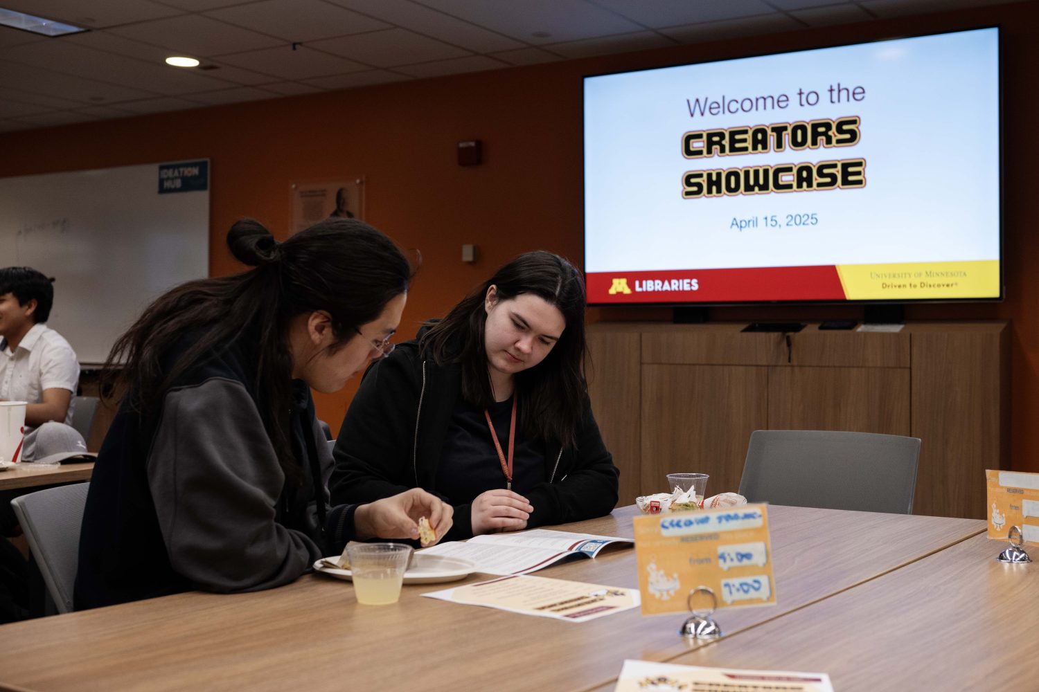 Students watch presentations at the Creators Showcase on April 14, 2025. (Photo/Adria Carpenter)