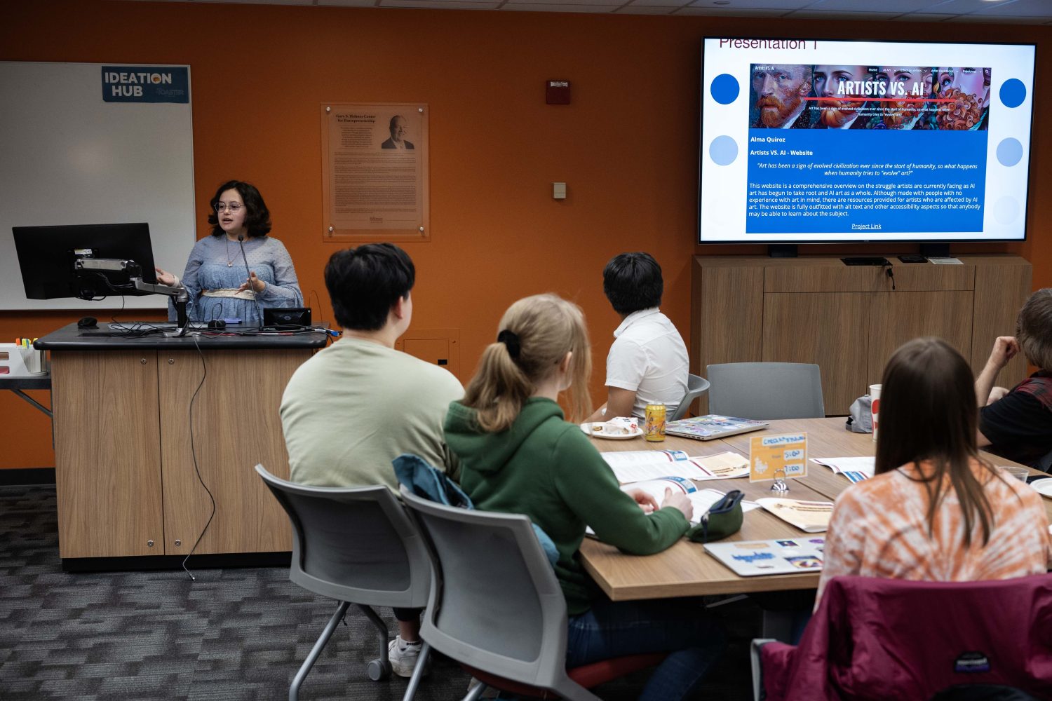 Alma Quiroz presents her project, "Artists VS. AI," at the Creators Showcase on April 14, 2025. (Photo/Adria Carpenter)