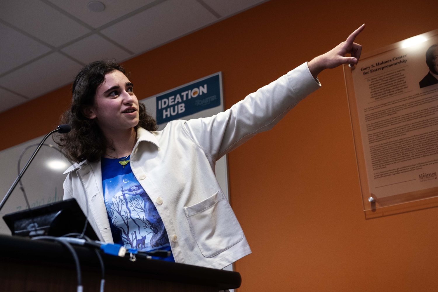 Amy Brewster showcases her digital art at the Creators Showcase on April 14, 2025. (Photo/Adria Carpenter)