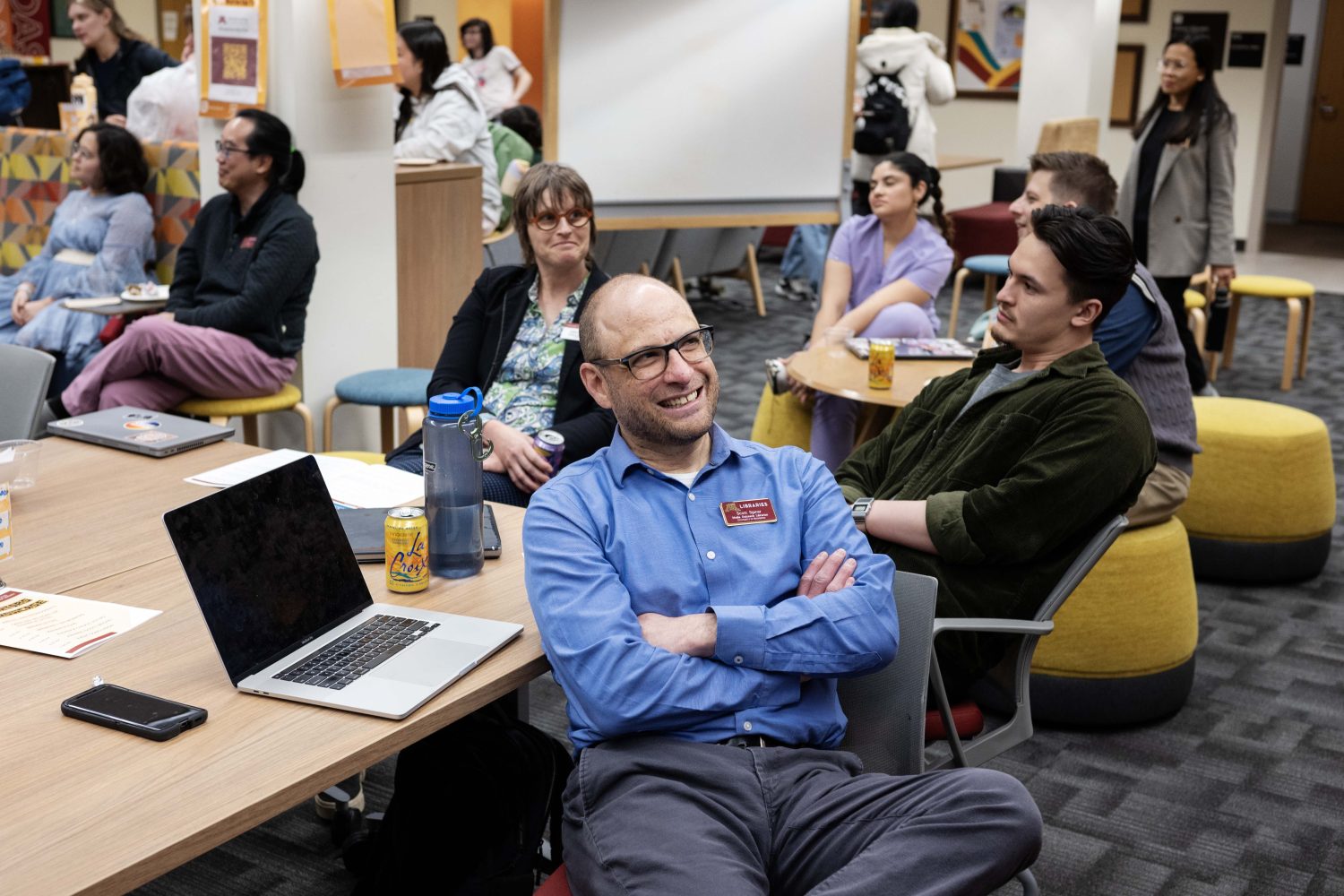 Media Outreach Librarian Scott Spicer watches presentations at the Creators Showcase on April 14, 2025. (Photo/Adria Carpenter)