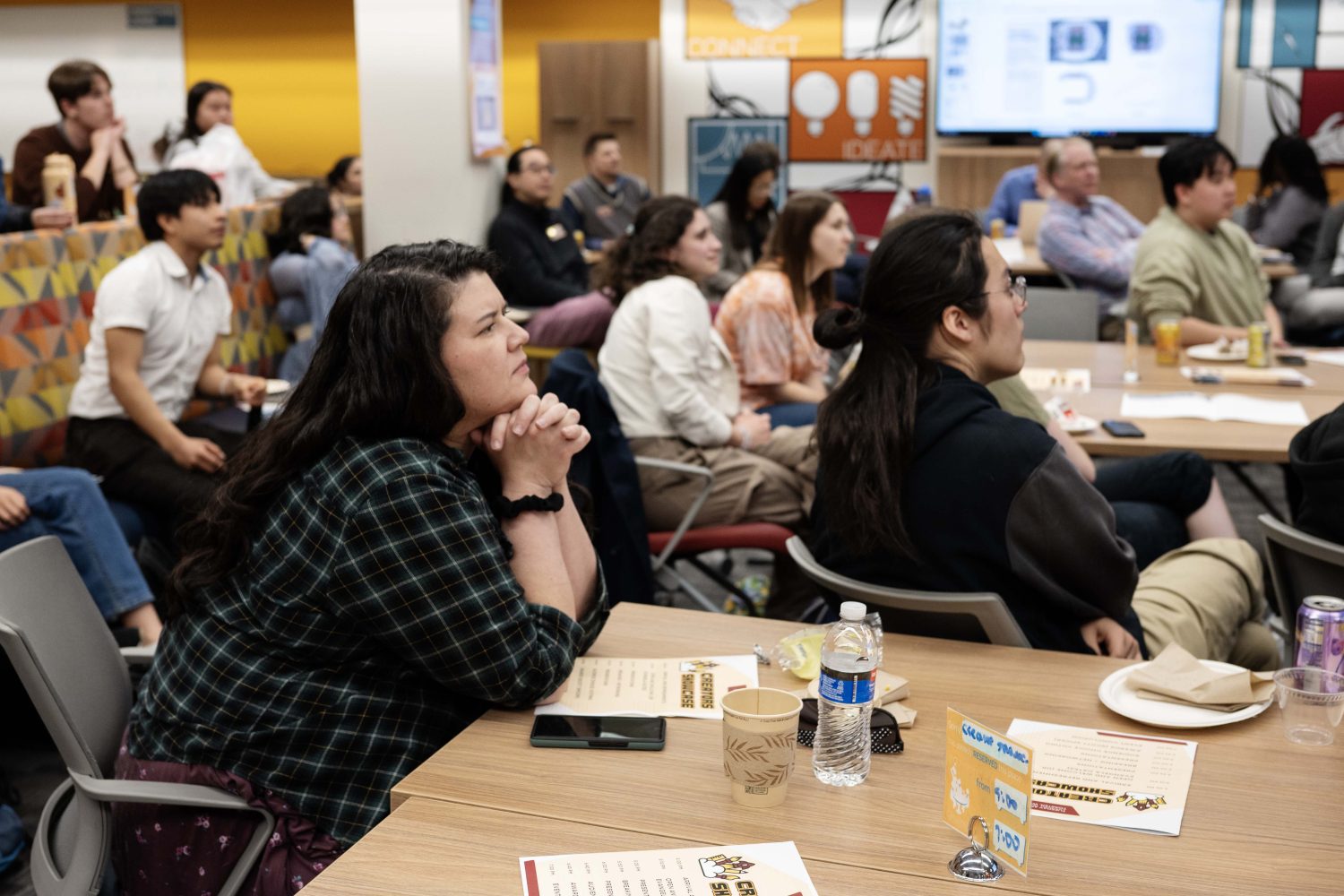 Students watch presentations at the Creators Showcase on April 14, 2025. (Photo/Adria Carpenter)
