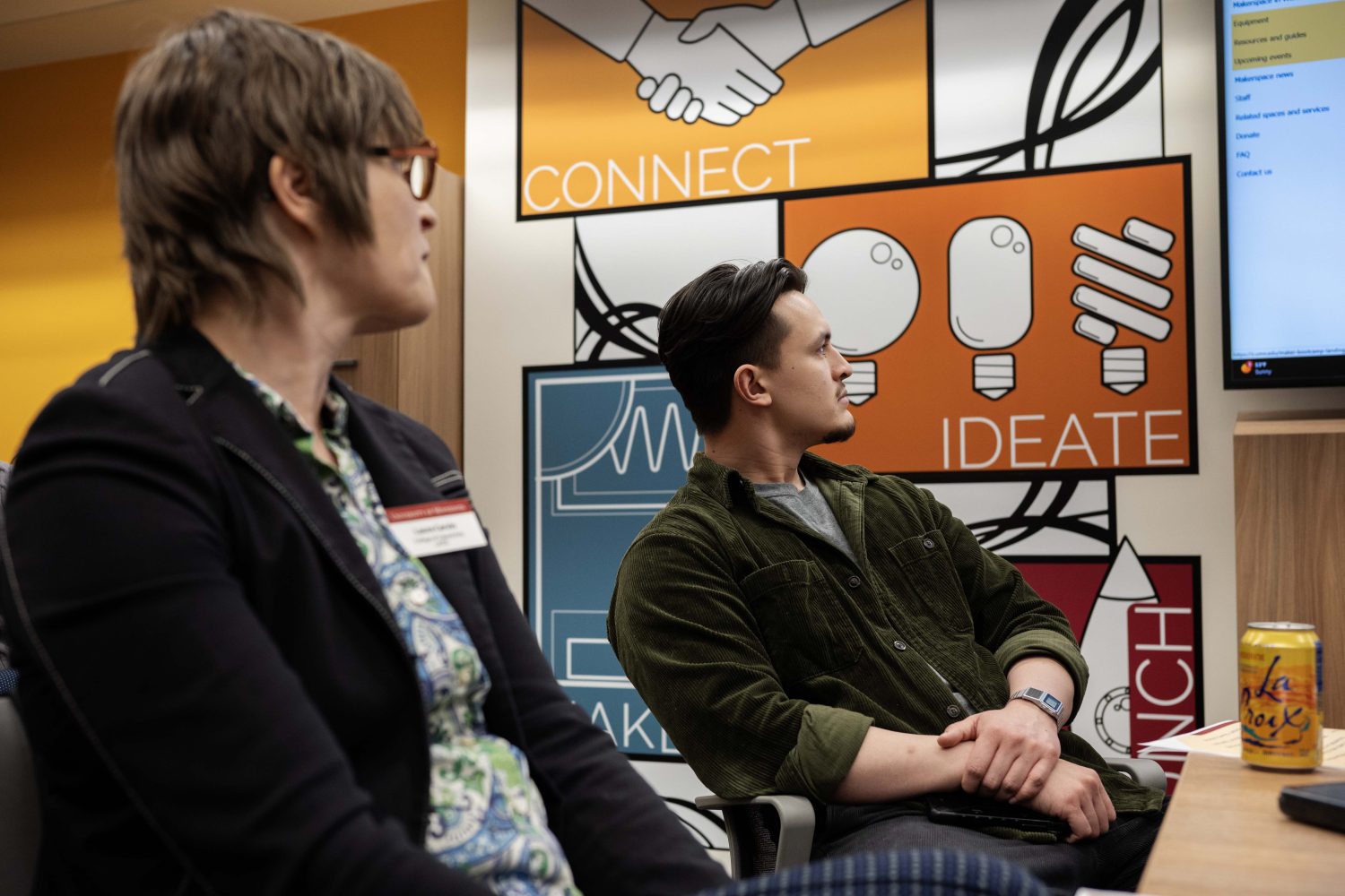 Laura Cervin and Steven Bleau watch presentations at the Creators Showcase on April 14, 2025. (Photo/Adria Carpenter)