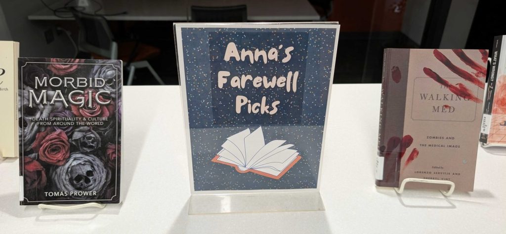 HSL's monthly book display, showing Anna's farewell picks from the stacks