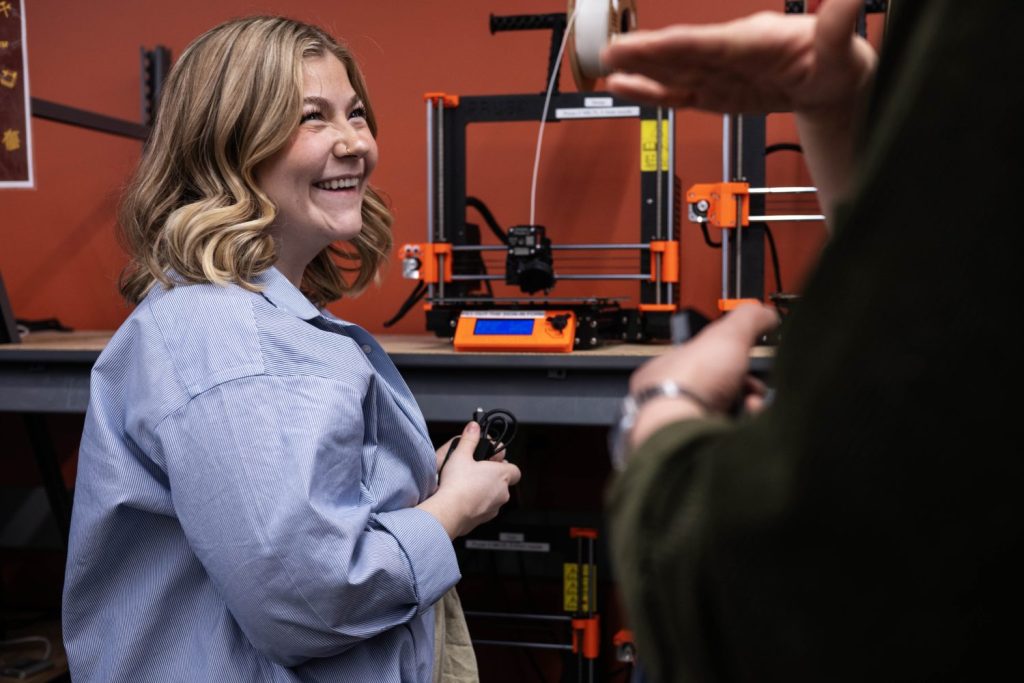 student using a 3d printer